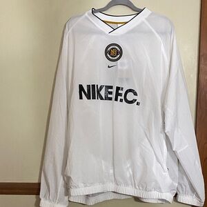 Nike White Windbreaker Jacket with Black Logo and Gold Accent